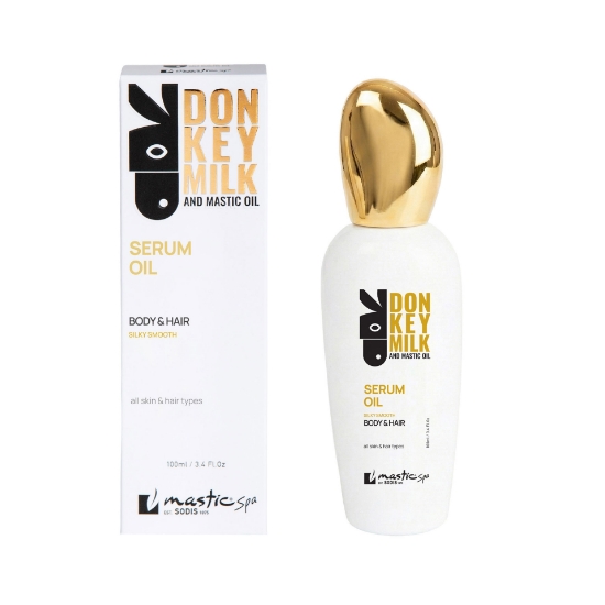 Mastic Spa Donkey Milk and Mastic Oil Serum Oil 100ml bottle with a gold cap next to its white and gold retail box.
