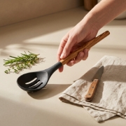 Silicone Slotted Spoon with Authentic Olive Wood Handle by Olea Wood Art shown in a premium ingredient detail ecommerce produ...