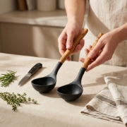 Silicone Soup Spoons with Olive Wood Handle shown in a premium ingredient detail ecommerce product image