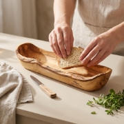Olea Wood Art Personalized Rustic Olive Wood Bread Stand 40cm on a kitchen counter