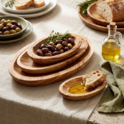 Personalized Olive Wood Oval Dish Set - 3 Handcrafted Cretan Bowls by Olea Wood Art in a natural lifestyle setting