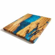 Olea Wood Art Olive Wood Resin Cutting Board 25x14cm with Blue Glass inlay on white background