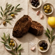 Carob Paximadi Rusks 260g - Wood-Oven Baked Cretan Barley Rusks by Xilofournos Mistrakis shown as a close-up product detail