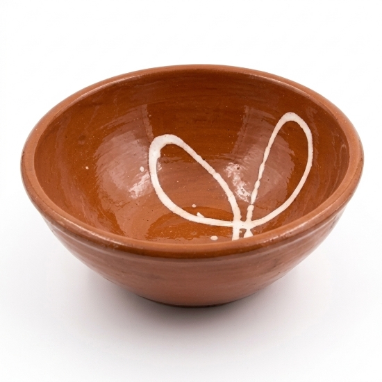 Sifnos Ceramics hand-thrown terracotta salad bowl with white painted design, on white background